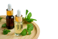 essential-oil-peppermint-bottle-with-fresh-green-peppermint_1150-38027-removebg-preview